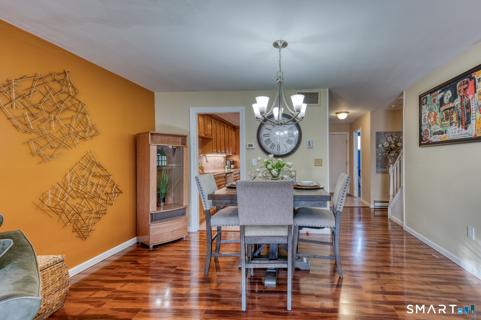 17 Hemlock Court, Unit 17 Cromwell, CT 06416 - Photo 6 of 36 a view of a dining room with furniture and wooden floor