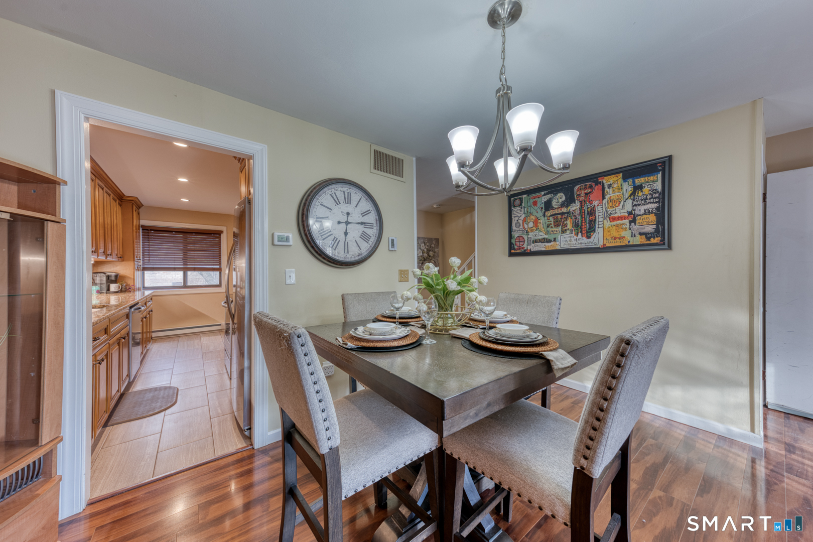 17 Hemlock Court, Unit 17 Cromwell, CT 06416 - Photo 8 of 36 a view of a dining area with furniture and wooden floor