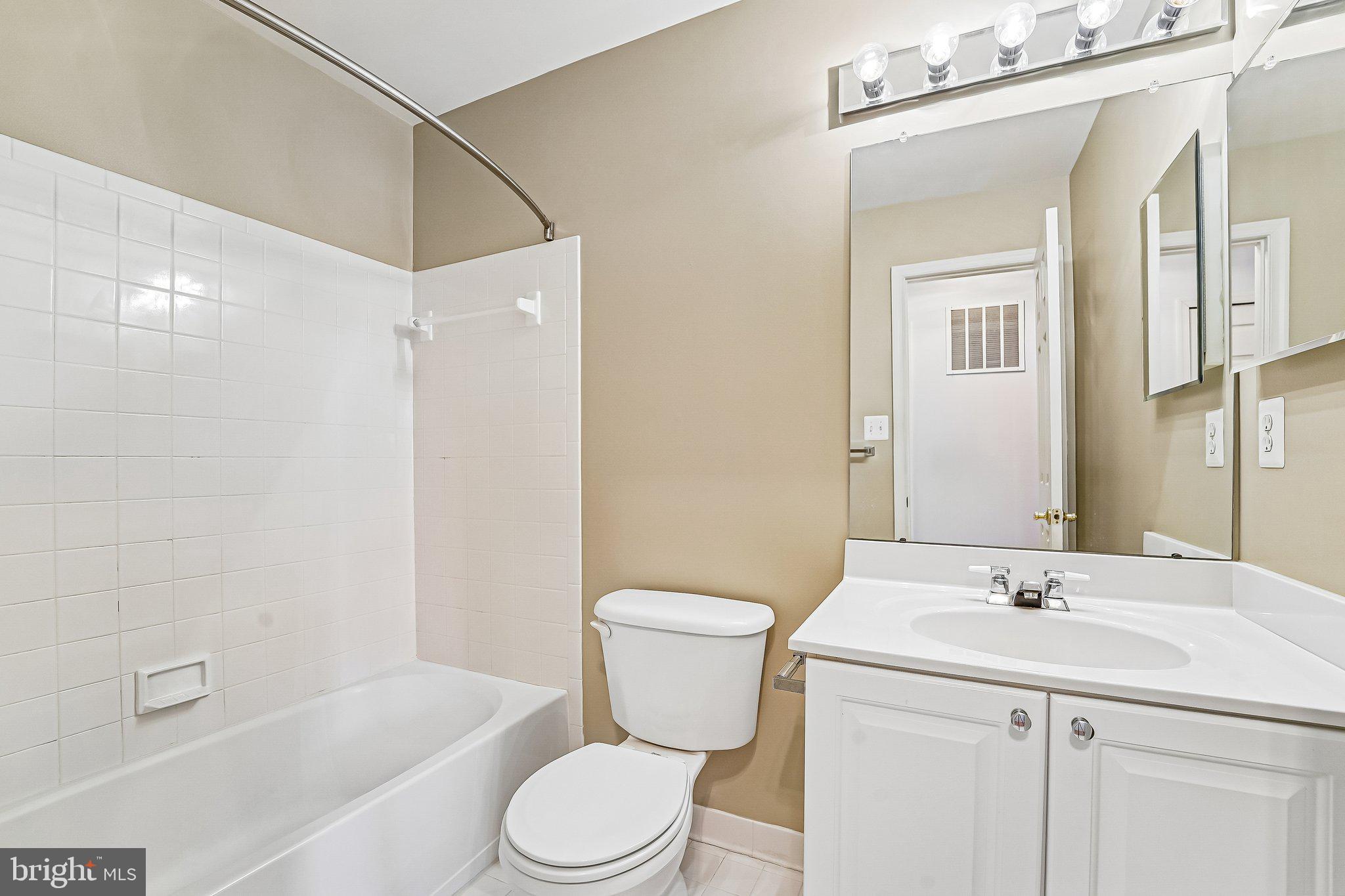 2422 Rippling Brook Road Frederick, MD 21701 - Photo 23 of 35 a bathroom with a sink a toilet and shower