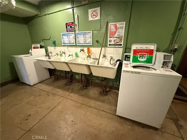 a view of a tables and chairs in a room