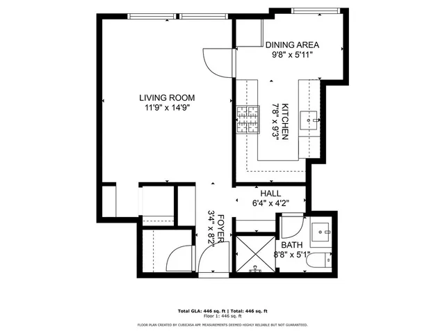 a picture of a bench in front of a wall