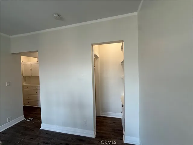 a view of a bathroom with wooden floor