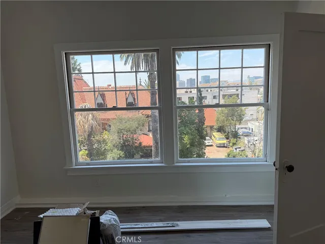 a view of a window and an empty room