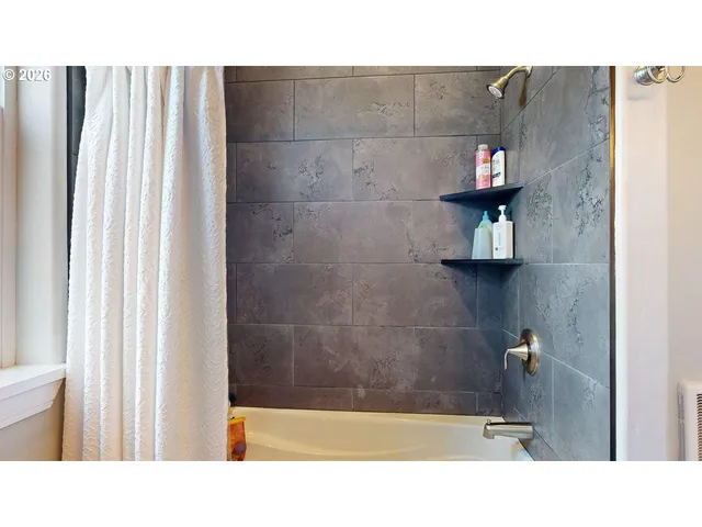 a black and white photo of a living room