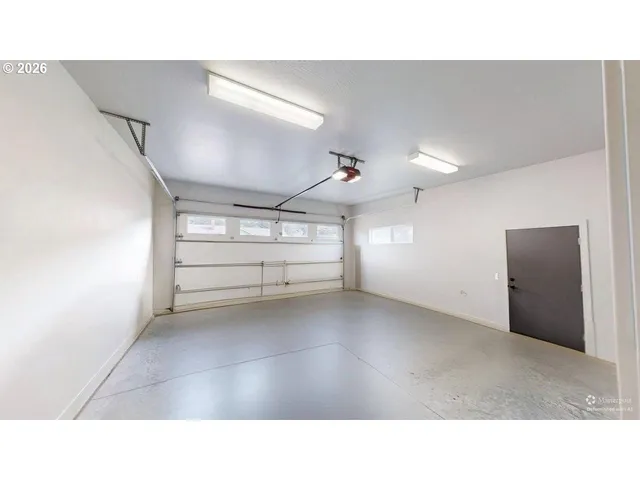 a black and white photo of a living room