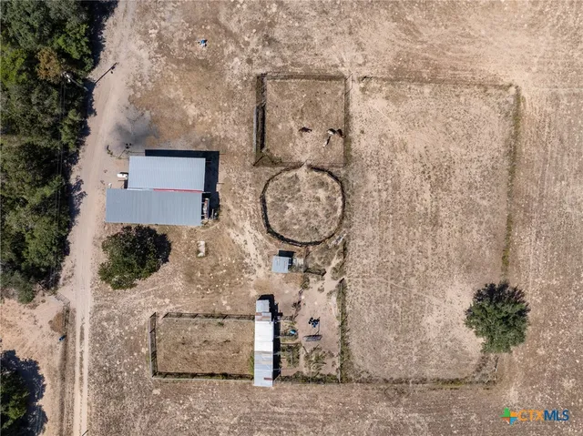 a view of swimming pool with a yard