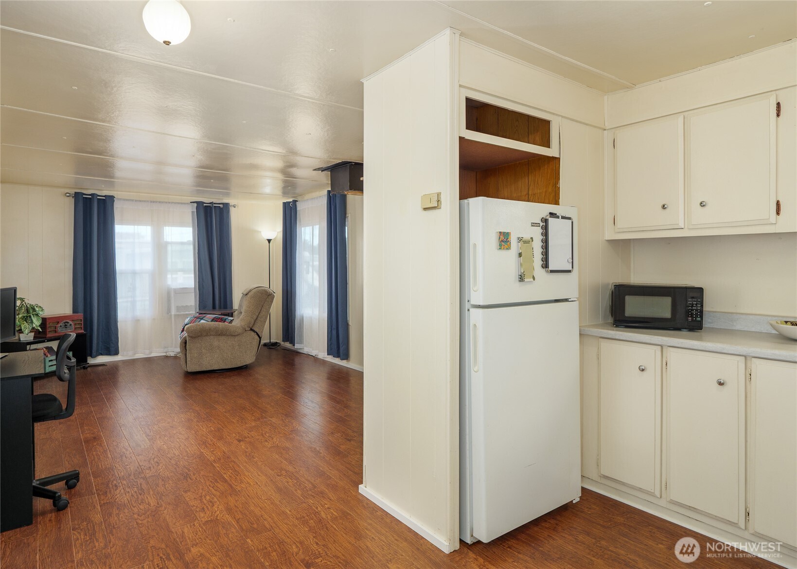 201 North 5th Avenue, Unit 19 Sequim, WA 98382 - Photo 11 of 25 a kitchen with stainless steel appliances a refrigerator and a stove top oven