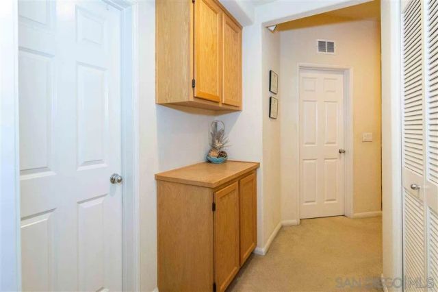a utility room with window washer and dryer
