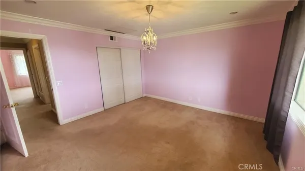 a view of a hallway with painted walls