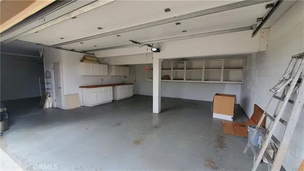 a view of a storage & utility room with racks
