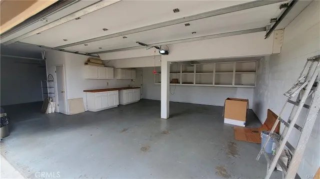 a view of a storage & utility room with racks