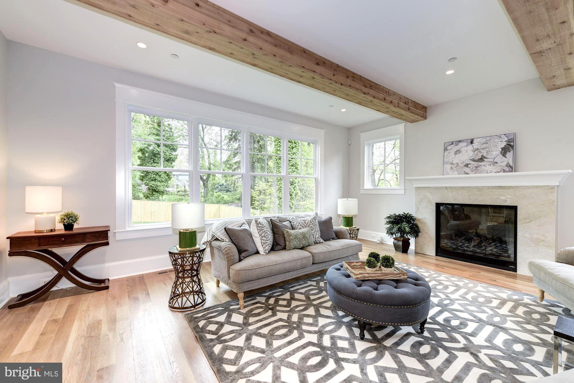 5907 Aberdeen Road Bethesda, MD 20817 - Photo 16 of 50 Family room with exposed beams & fireplace