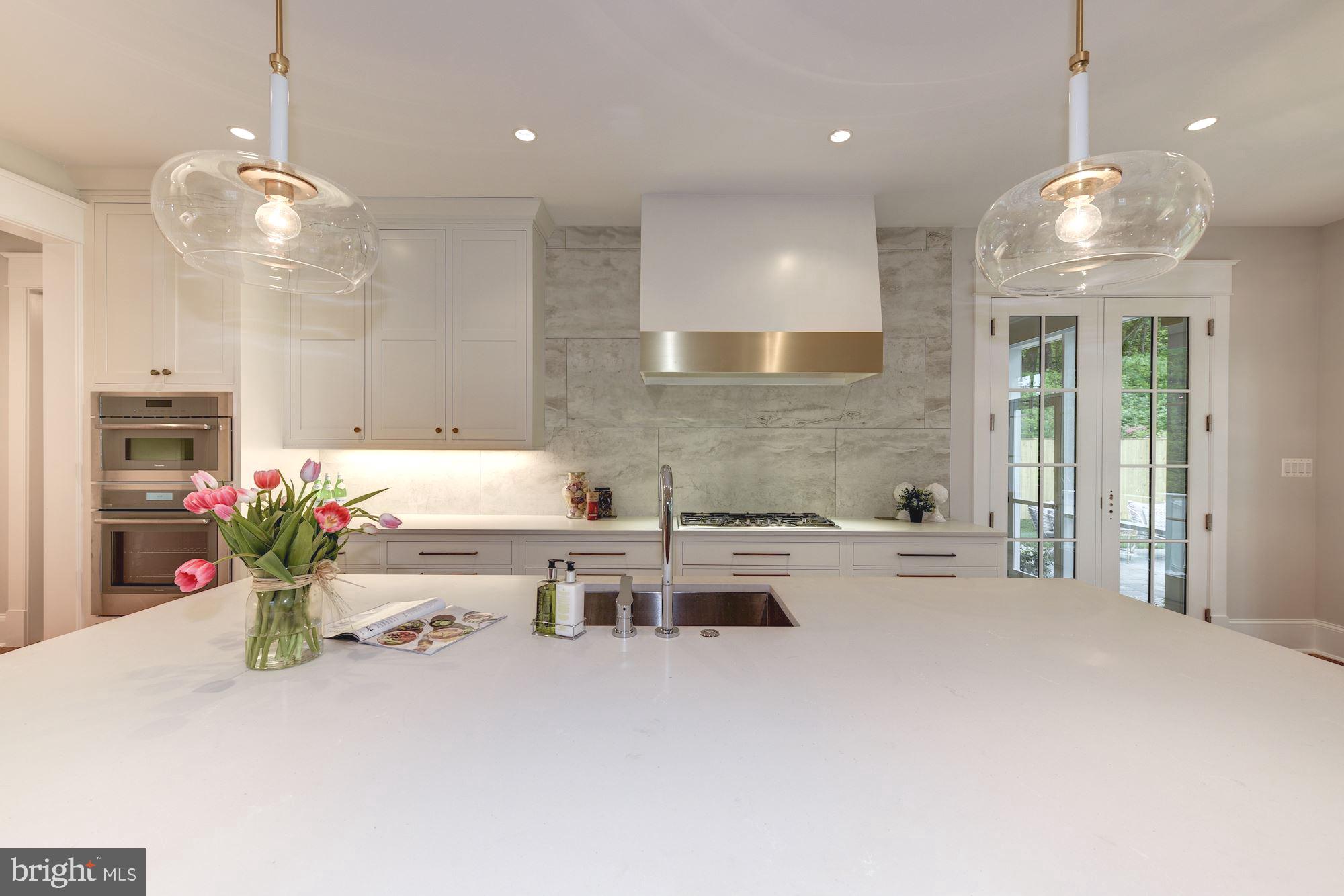 5907 Aberdeen Road Bethesda, MD 20817 - Photo 20 of 50 Expansive center island with seating