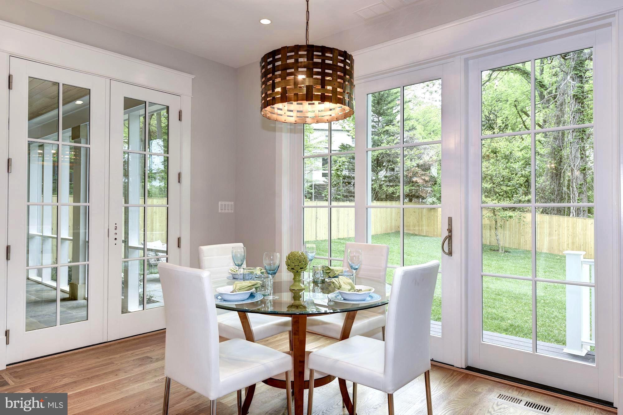 5907 Aberdeen Road Bethesda, MD 20817 - Photo 25 of 50 Breakfast room adjoining screened-in porch & patio