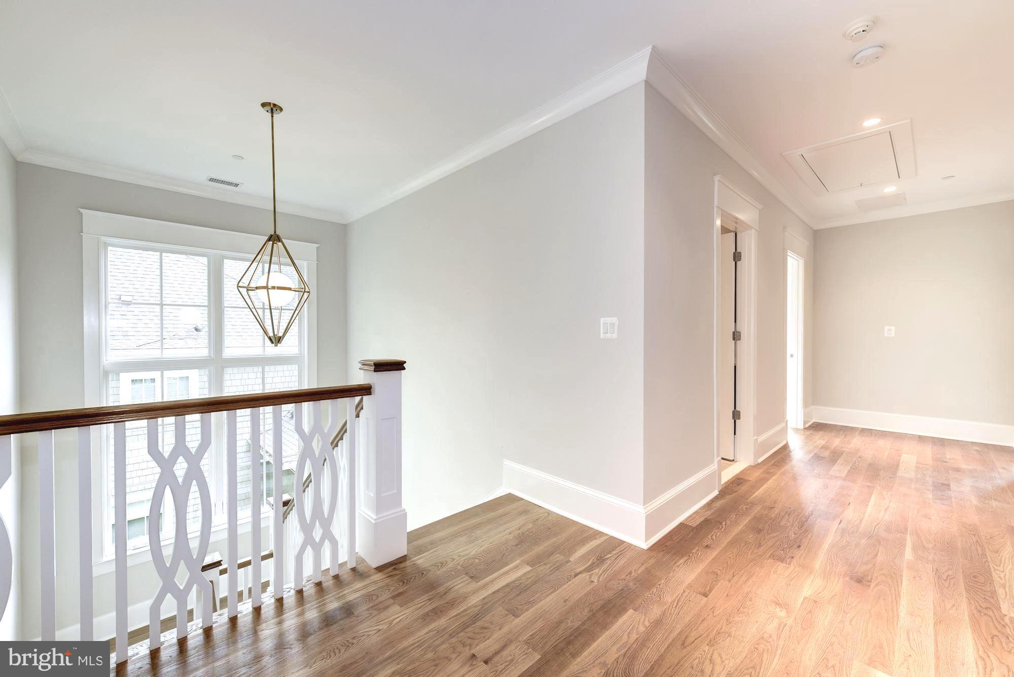 5907 Aberdeen Road Bethesda, MD 20817 - Photo 28 of 50 Second floor landing with custom rail detailing