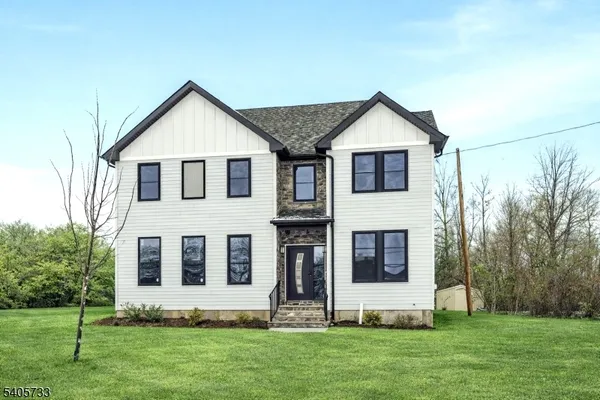 a front view of house with a yard