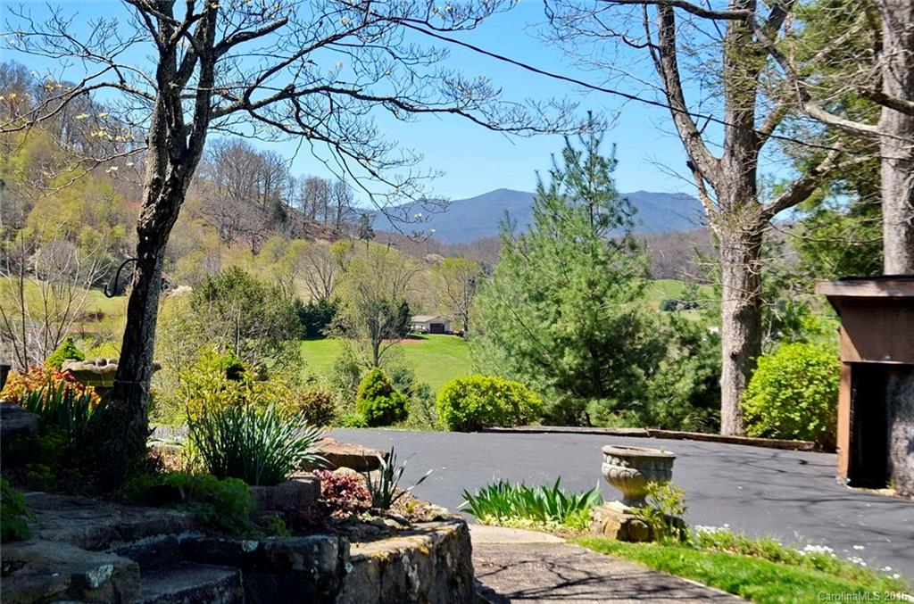 110-114 Hilltop Road Waynesville, NC 28786 - Photo 20 of 21 an outdoor view with patio