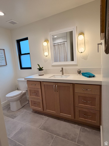 3626 Riverstone Road Mapleton, UT 84664 - Photo 26 of 58 Full bath featuring vanity, curtained shower, and dark tile patterned flooring