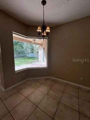 a view of a room with windows