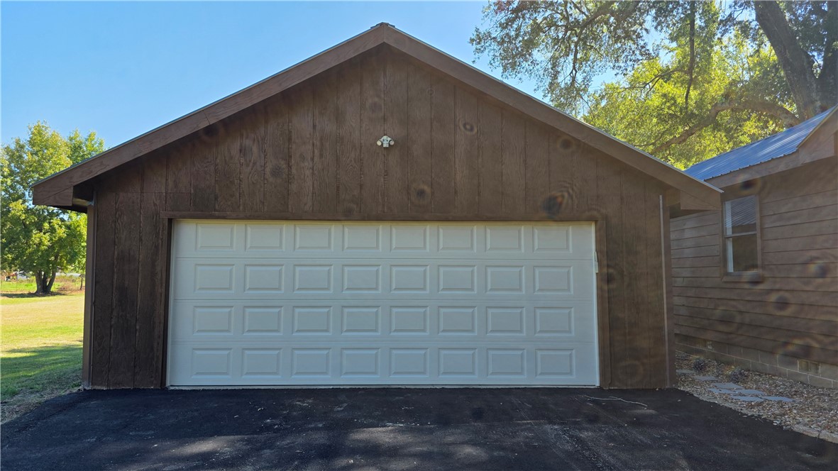 203 Austin School Crossing Road Atkins, AR 72823 - Photo 6 of 40 Front of garage