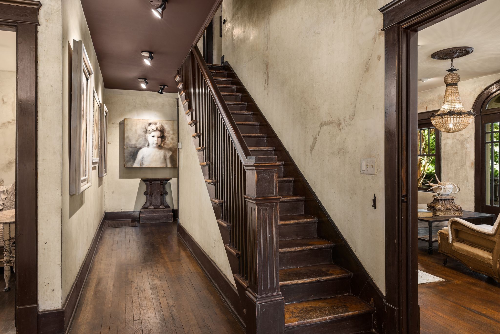 707 Inverness Avenue Nashville, TN 37204 - Photo 16 of 45 a view of a hallway with wooden floor and staircase