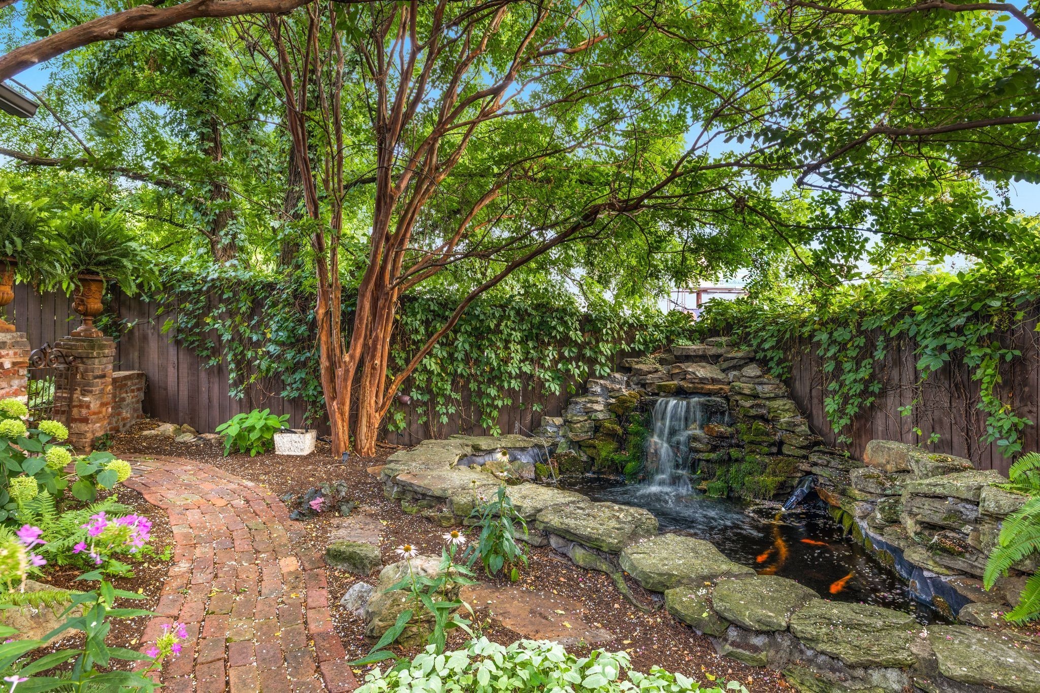 707 Inverness Avenue Nashville, TN 37204 - Photo 22 of 45 a view of a yard with plants and large trees