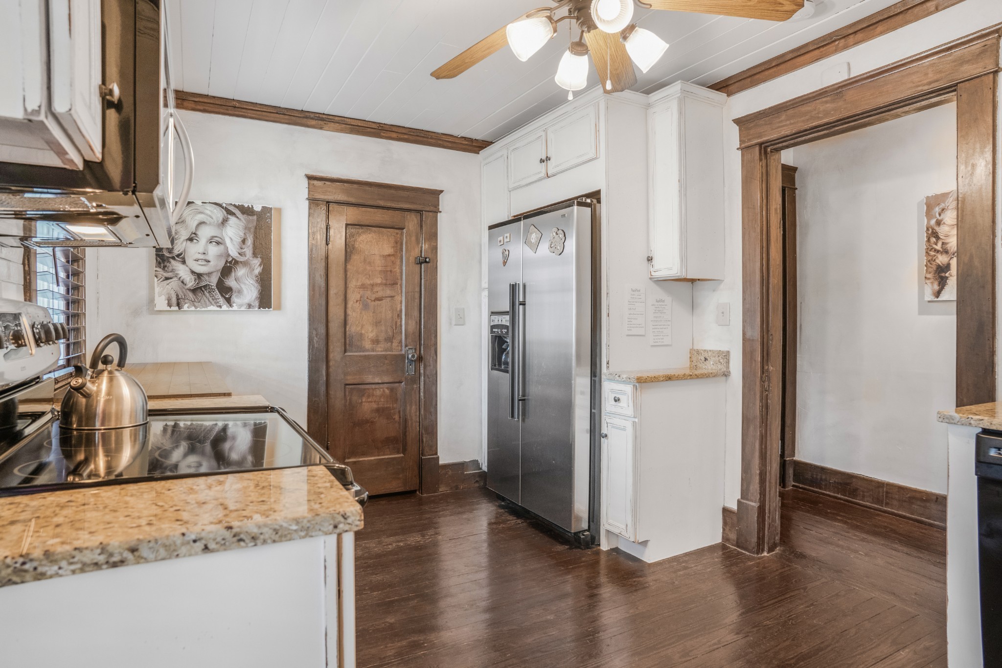 707 Inverness Avenue Nashville, TN 37204 - Photo 34 of 45 a kitchen with stainless steel appliances granite countertop a refrigerator and a sink