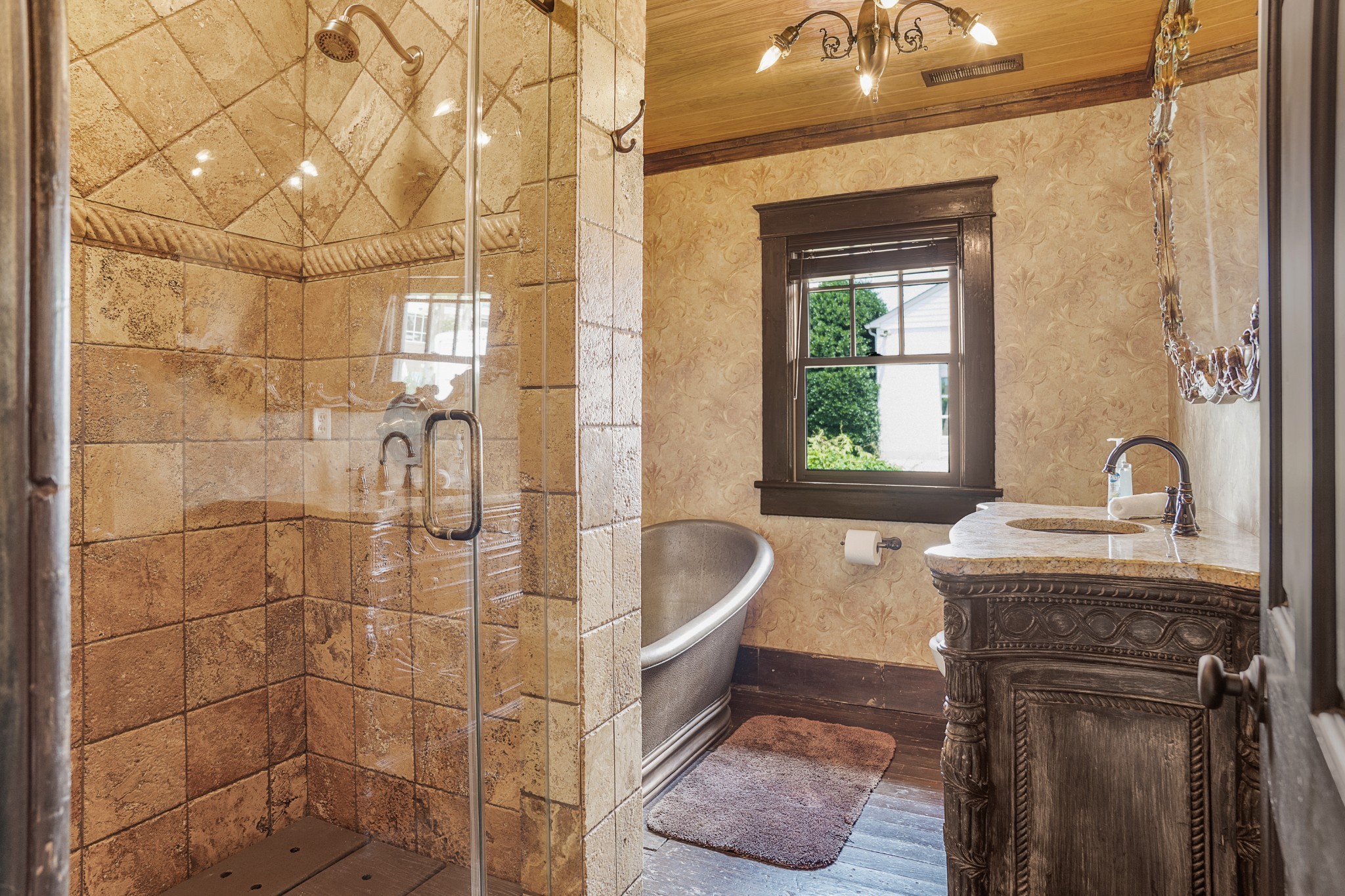 707 Inverness Avenue Nashville, TN 37204 - Photo 40 of 45 a bathroom with a sink a bathtub and window