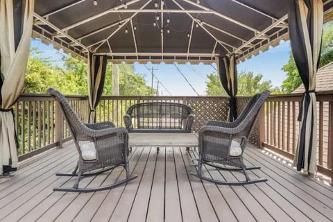 a view of chairs on the deck