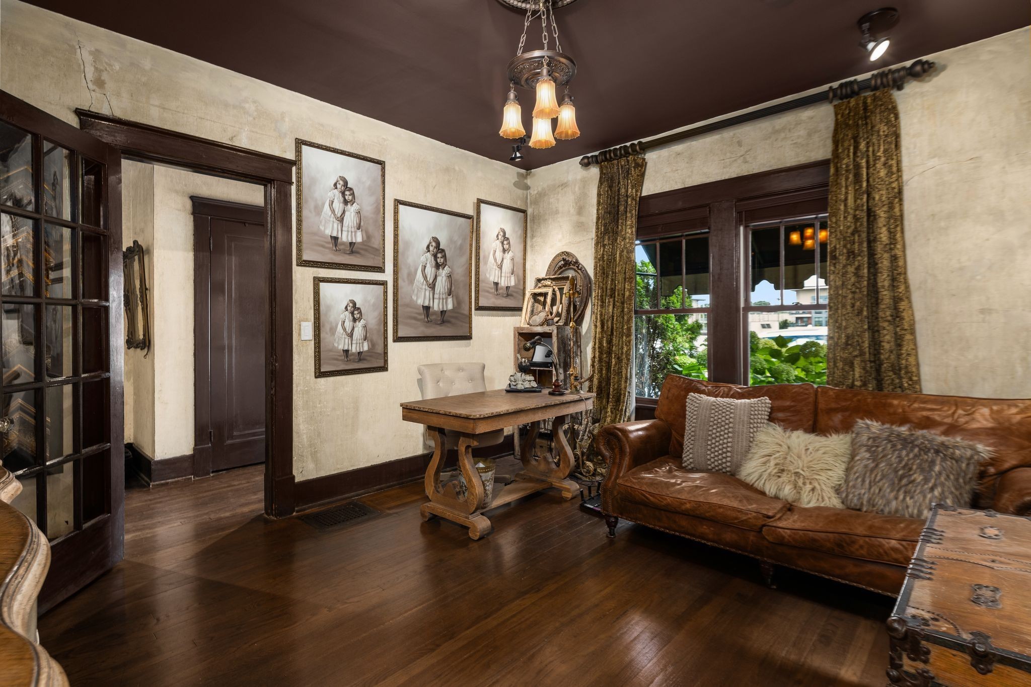 707 Inverness Avenue Nashville, TN 37204 - Photo 5 of 45 a living room with furniture a table and wooden floor