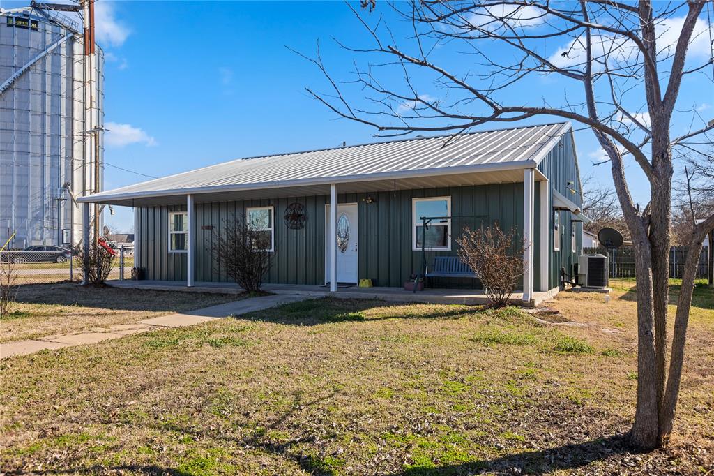 702 Main Windom, TX 75492 - Photo 18 of 30 a view of a house with a patio