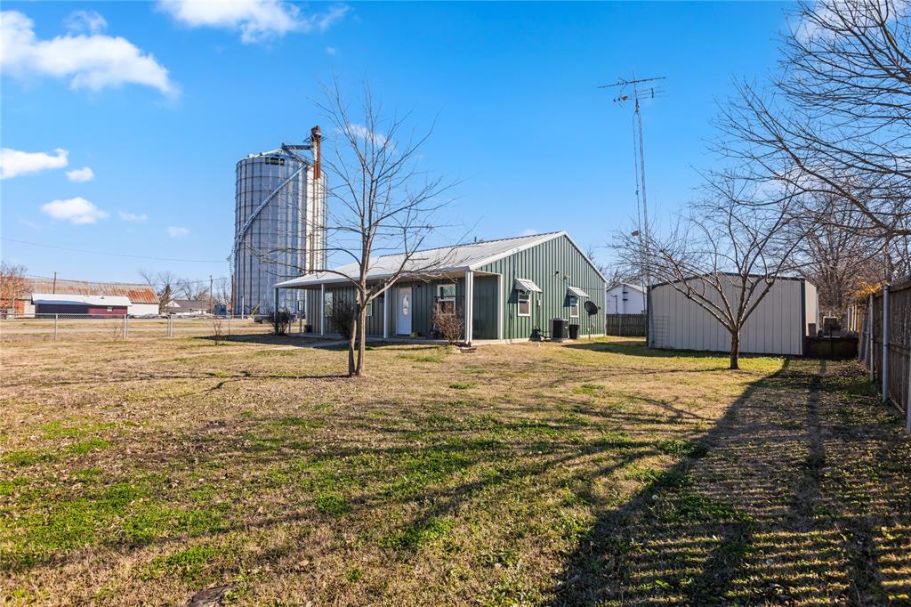 702 Main Windom, TX 75492 - Photo 20 of 30 a house view with a outdoor space