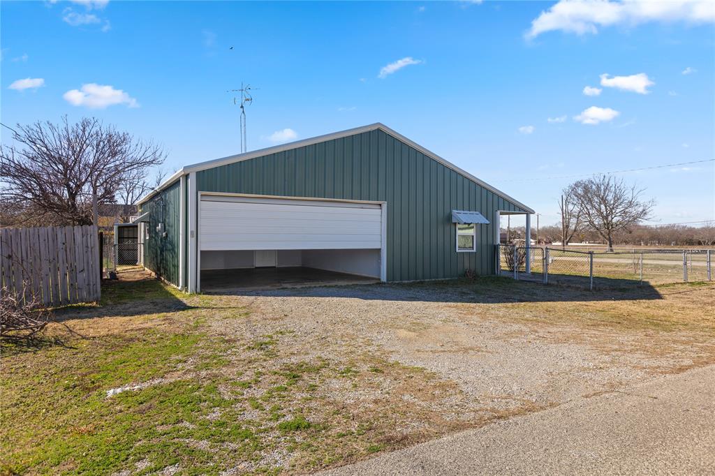 702 Main Windom, TX 75492 - Photo 21 of 30 a house view with a outdoor space