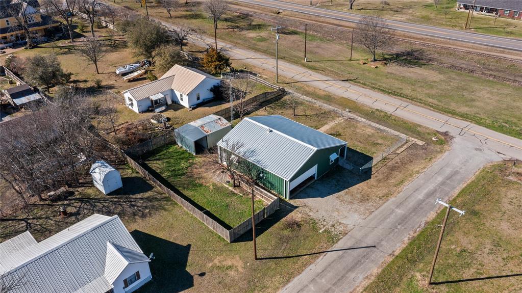702 Main Windom, TX 75492 - Photo 27 of 30 an aerial view of a house with a yard