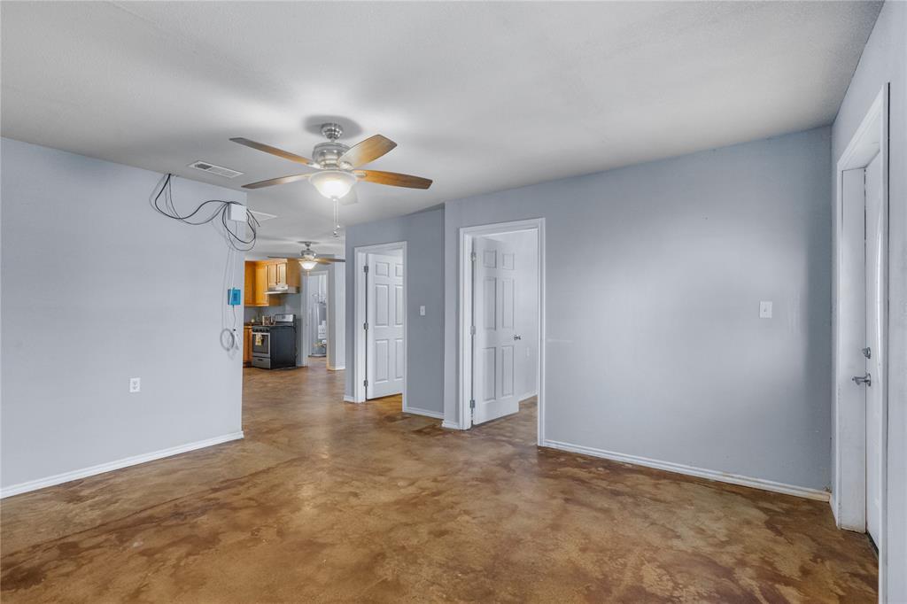 702 Main Windom, TX 75492 - Photo 8 of 30 wooden floor in an empty room