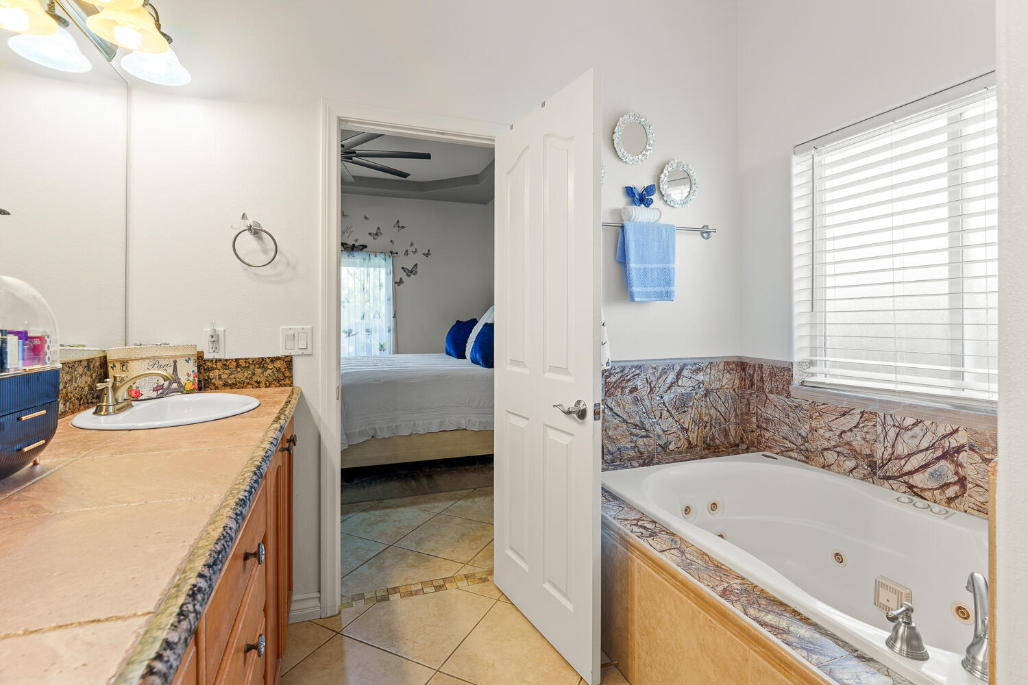 67305 Medano Road Cathedral City, CA 92234 - Photo 14 of 37 a en suite spacious bathroom with a tub sink and mirror