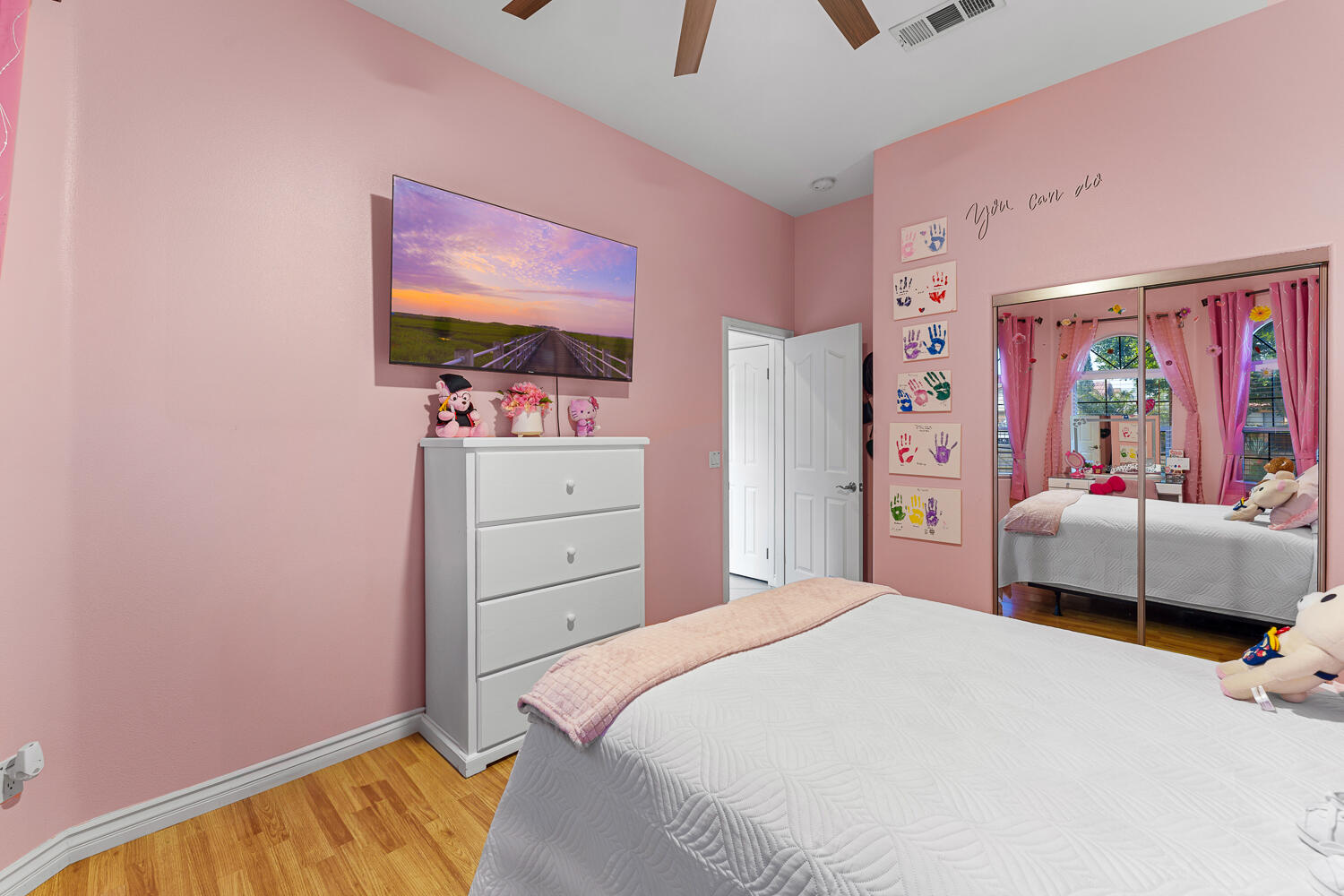 67305 Medano Road Cathedral City, CA 92234 - Photo 16 of 37 a bedroom with a bed and a dresser