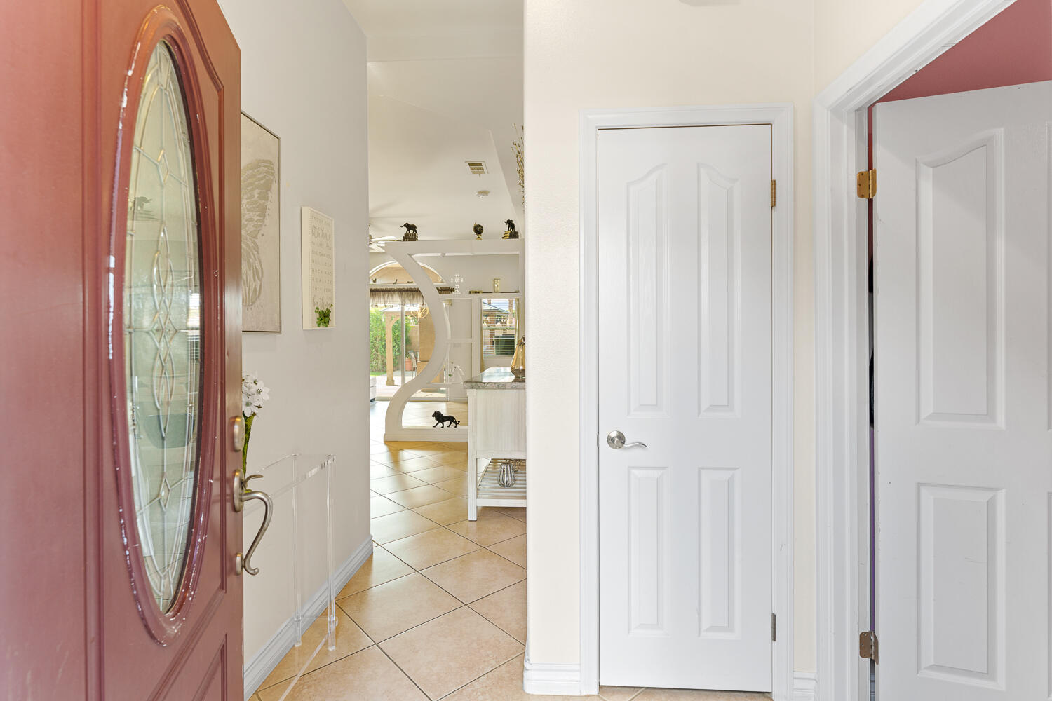 67305 Medano Road Cathedral City, CA 92234 - Photo 17 of 37 a bathroom with a glass door shower