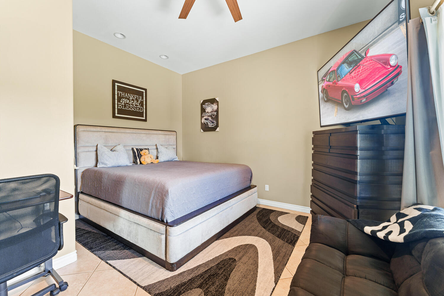 67305 Medano Road Cathedral City, CA 92234 - Photo 18 of 37 a bedroom with a bed and painting on the wall