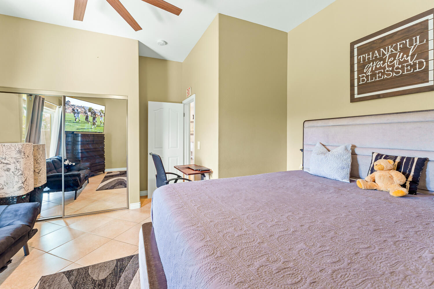 67305 Medano Road Cathedral City, CA 92234 - Photo 19 of 37 a bedroom with a bed and wooden floor