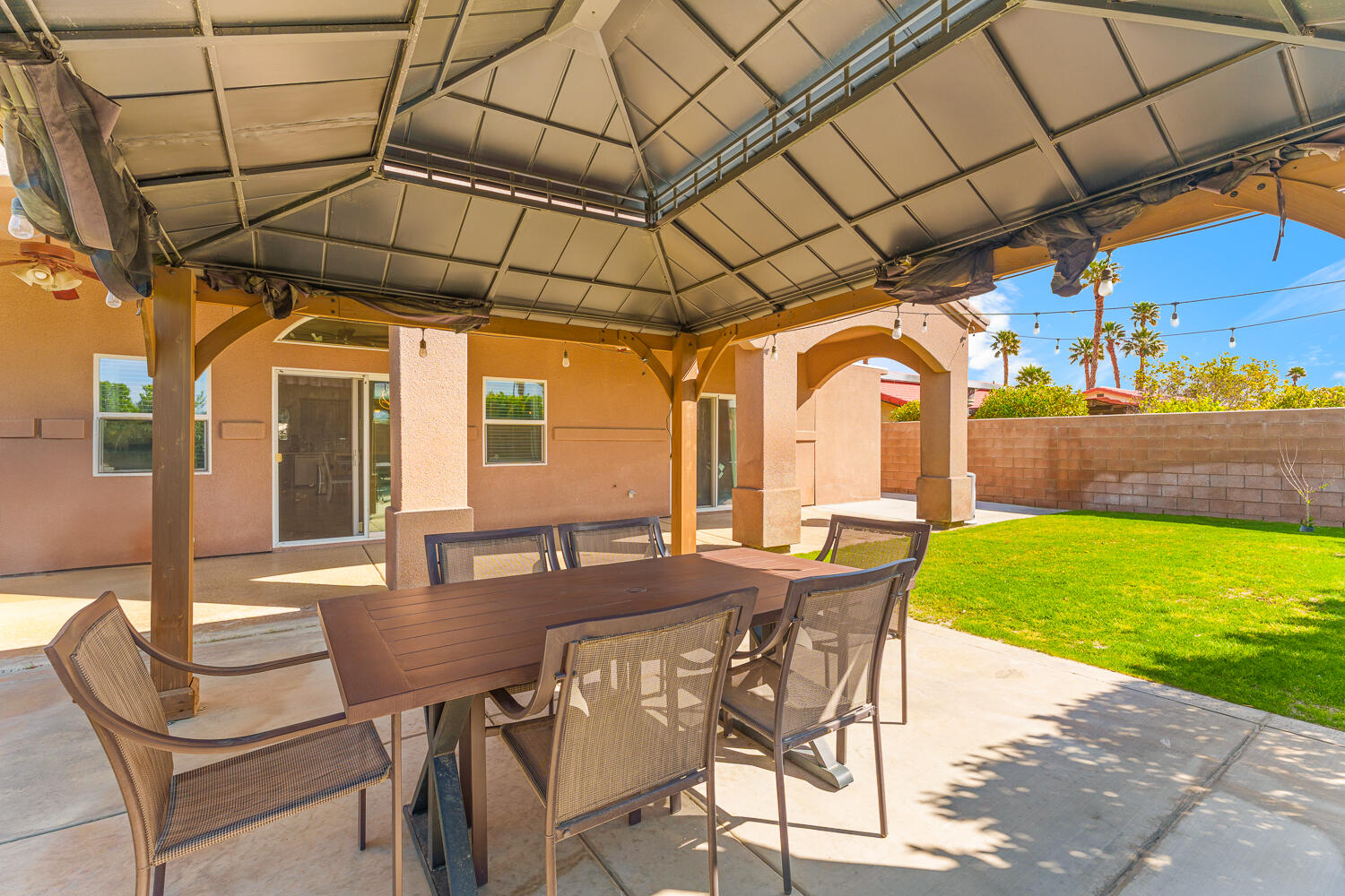 67305 Medano Road Cathedral City, CA 92234 - Photo 29 of 37 a view of yard with patio