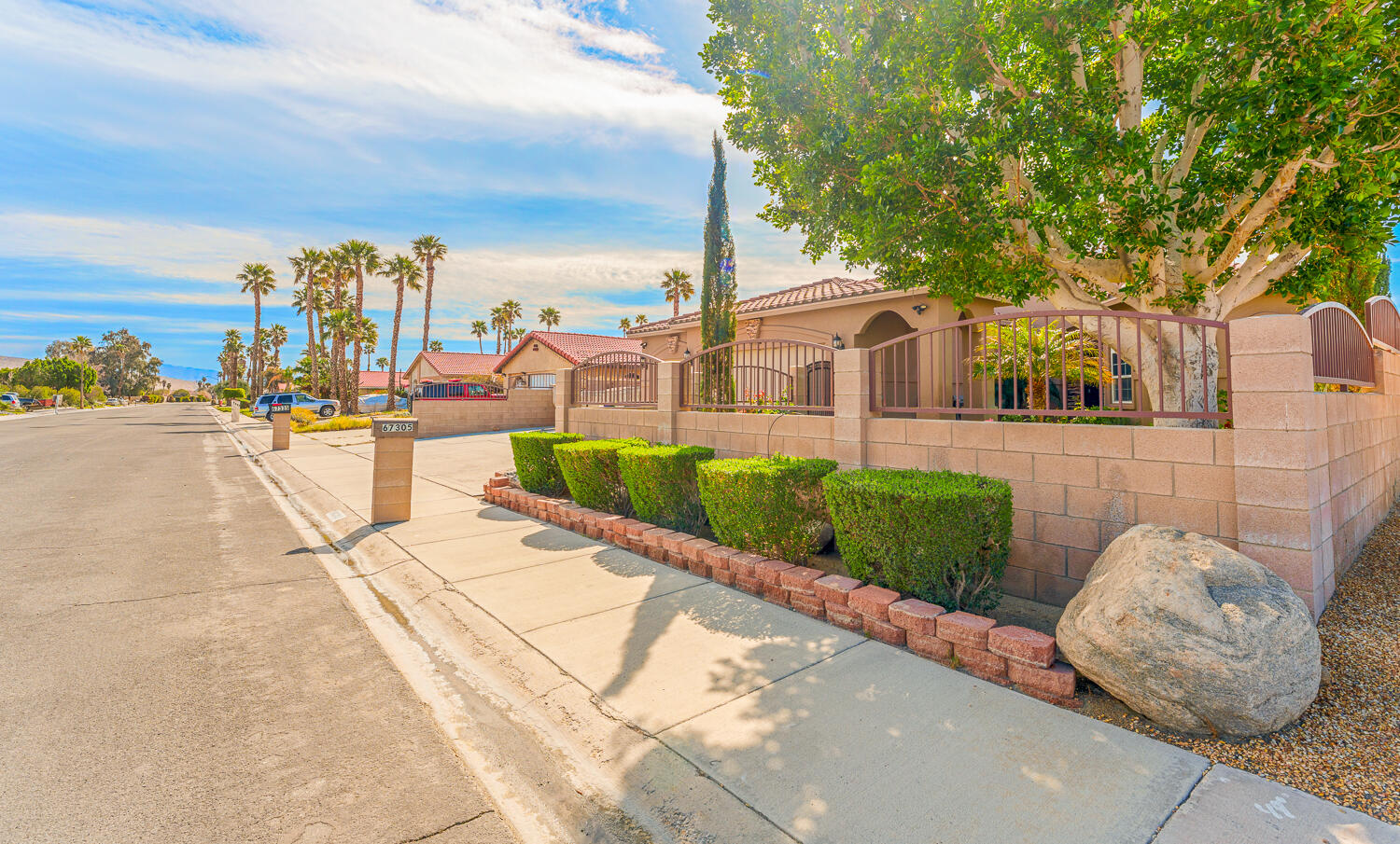 67305 Medano Road Cathedral City, CA 92234 - Photo 35 of 37 a view of a backyard with sitting area