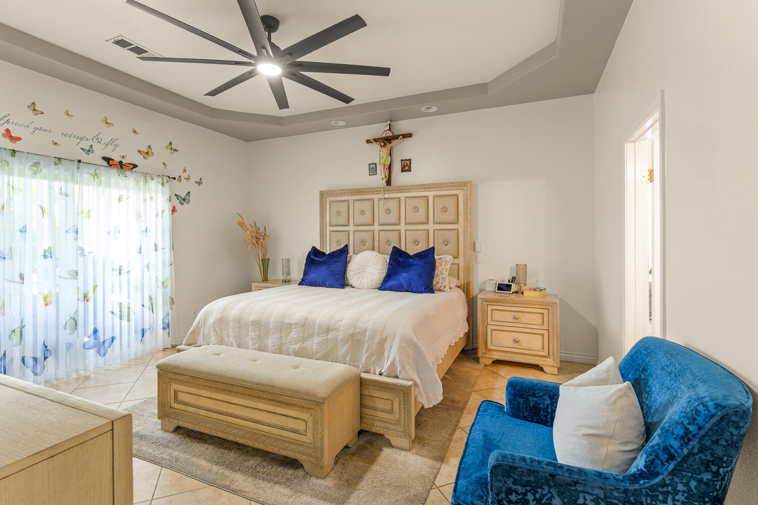 67305 Medano Road Cathedral City, CA 92234 - Photo 10 of 37 a bedroom with a bed couches and chandelier