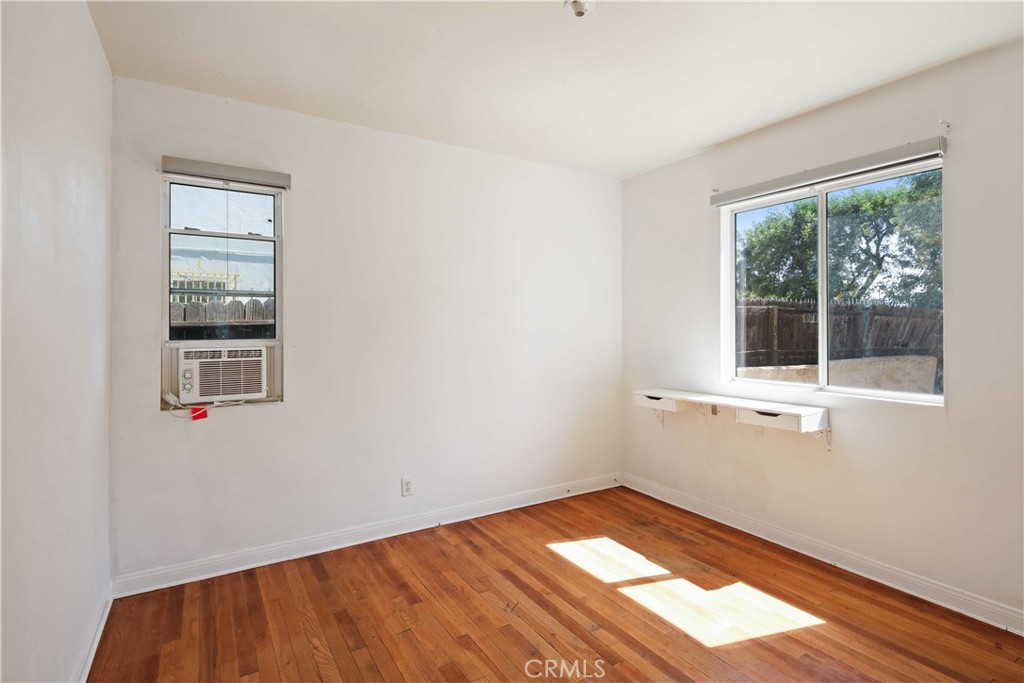 5940 Cedros Avenue Van Nuys, CA 91411 - Photo 17 of 23 a view of empty room with wooden floor and fan