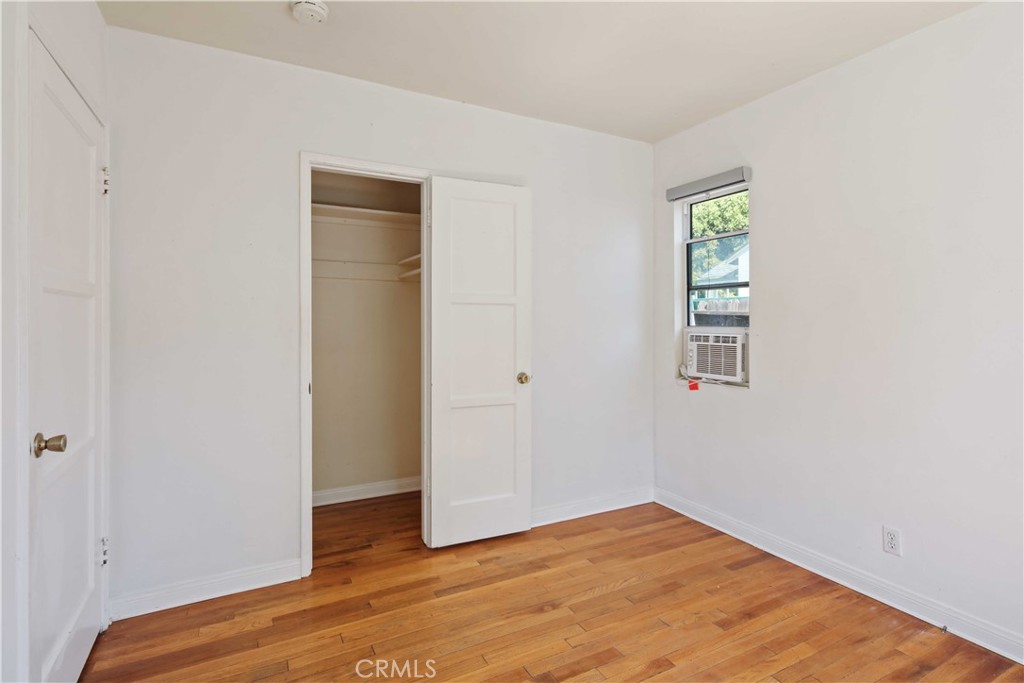 5940 Cedros Avenue Van Nuys, CA 91411 - Photo 18 of 23 a view of empty room with wooden floor and fan