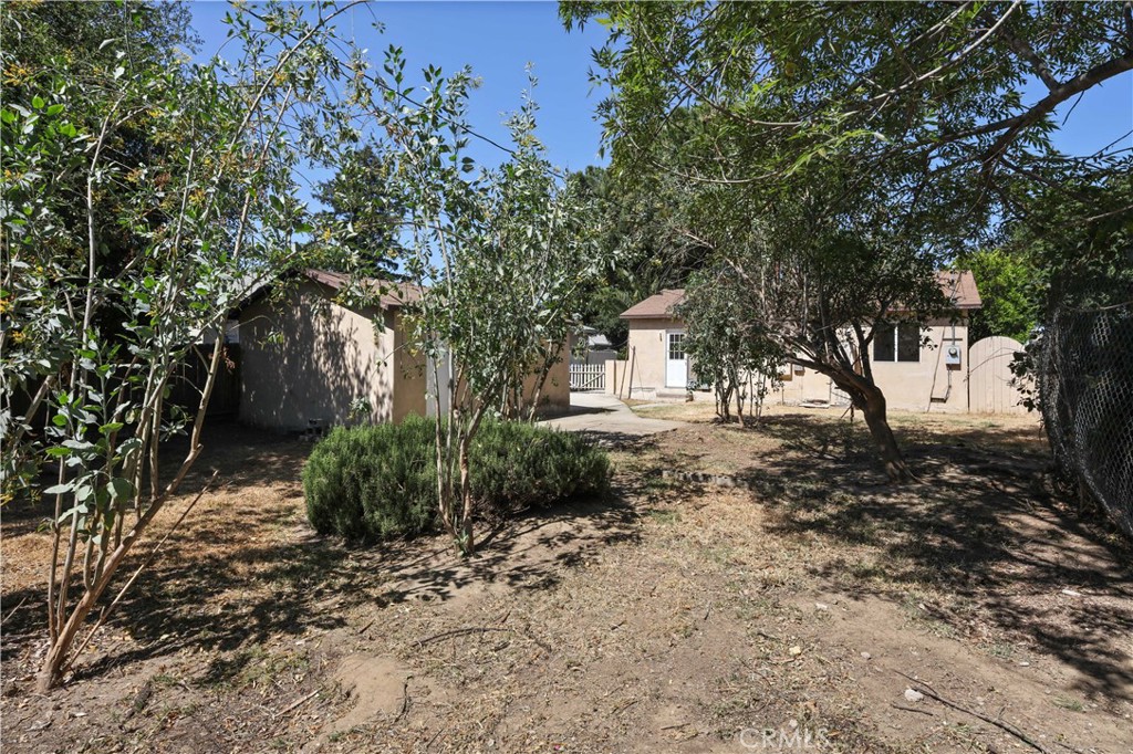5940 Cedros Avenue Van Nuys, CA 91411 - Photo 22 of 23 a view of a house with a tree