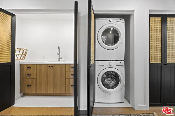 a view of a patio with a table chairs and a table