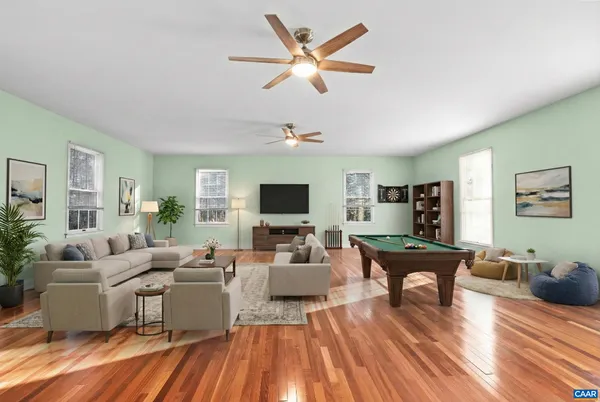 a view of a hallway view with staircase