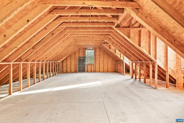 a view of an empty room with stairs