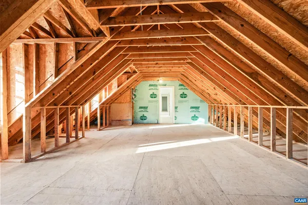 a view of a room with wooden walls